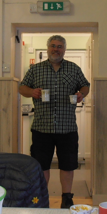 Tim with coffee and soup